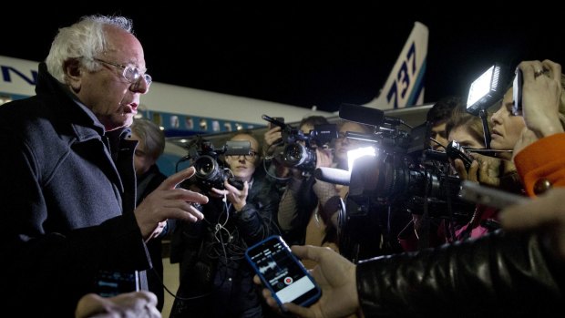 Vermont senator Bernie Sanders speaks to the media after arriving in Minnesota about his defeat in South Carolina.