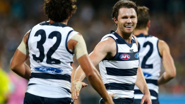 Cats Steven Motlop and Patrick Dangerfield celebrate a goal in the match against the Gold Coast Suns.
