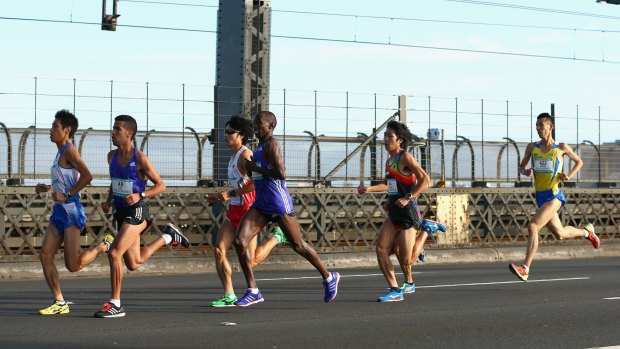 Bridge closed to traffic: Competitors run in the Sydney marathon during the Blackmores Sydney Running Festival.