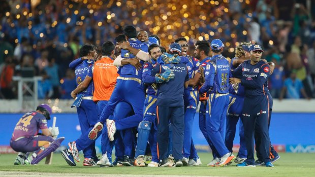 Defending champs: Mumbai Indians celebrate winning last season's IPL.