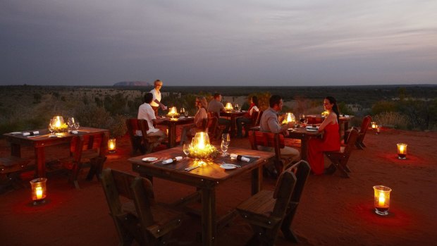 The Tali Wiru experience: A unique dining experience on an isolated dune top overlooking Uluru and the distant domes of Kata Tjuta.