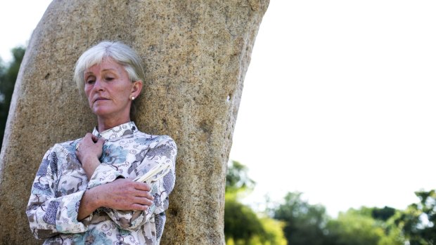 Susi Johnston outside the home her late husband bought through a nominee agreement.