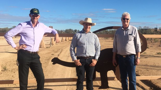 Mark Bailey, Winton Mayor Butch Lenton and Robbie Katter outside the Australian Age of Dinosaurs Museum.