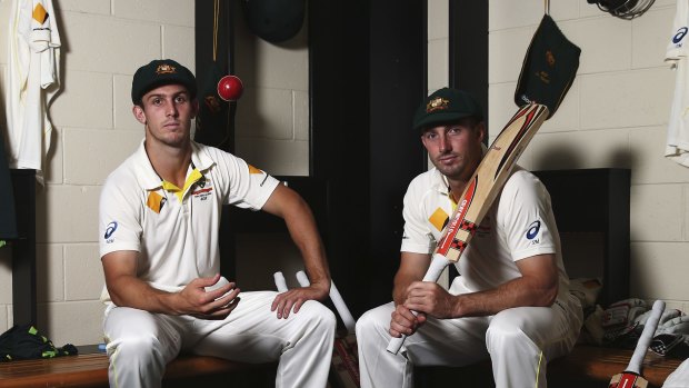 Brothers in arms: Mitch and Shaun Marsh in the rooms at the Gabba on Tuesday.