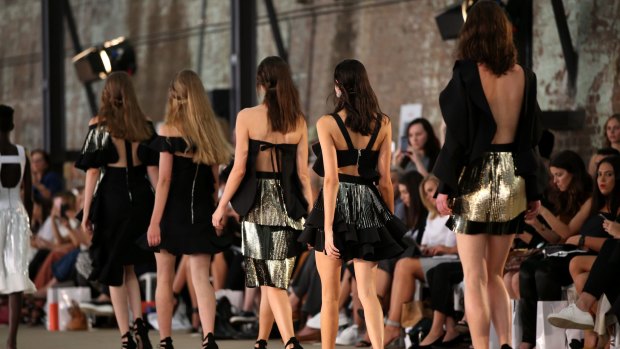 The models at By Johnny's show at Mercedes-Benz Fashion Week put their backs into it.