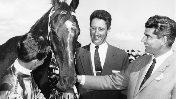 Winning team: Bart Cummings (right) with jockey Roy Higgins, winning horse Red Handed and stable foreman Maurice Yeomans at the 1967 Melbourne Cup.