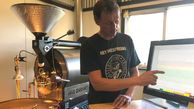 Brad Bradshaw using roasting software to perfect his coffee batch. 