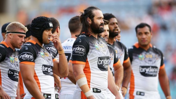 Leader of the pack: Wests Tigers skipper Aaron Woods (centre) will join the Bulldogs in 2018. 