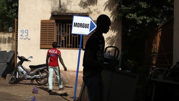 Hospital staff outside the morgue of the Gabriel Toure hospital in Bamako, Mali, on Sunday.