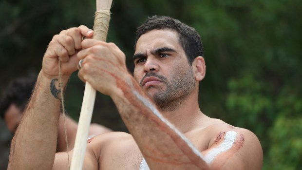 Role model: Greg Inglis makes a spear during the Indigenous All Stars camp.