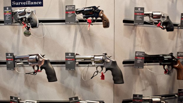 Guns on display in the Smith & Wesson booth at a gun expo in Tennessee in April. 