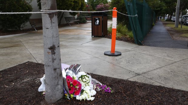 Flowers left at the front of St Leonard's College in Brighton East.