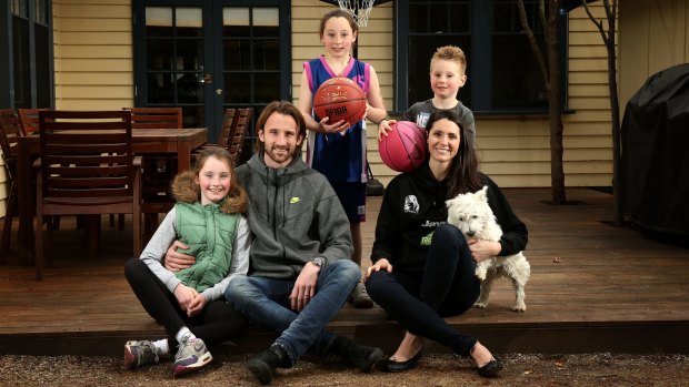 Returning WNBL basketballer Jacinta Kennedy with her husband Josh Kennedy, a retired Socceroo, their three children, Jada , Isabelle and Lachie, and dog Ned.