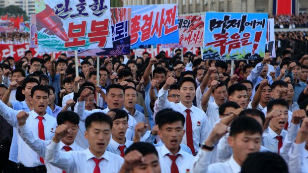 North Koreans gather at Kim Il Sung Square to attend a recent mass rally against America.