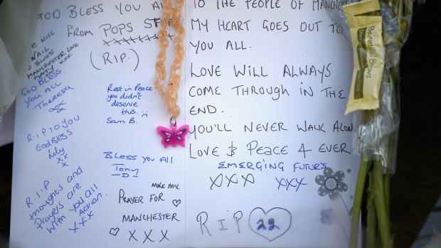 Tributes left in central Manchester on Tuesday.