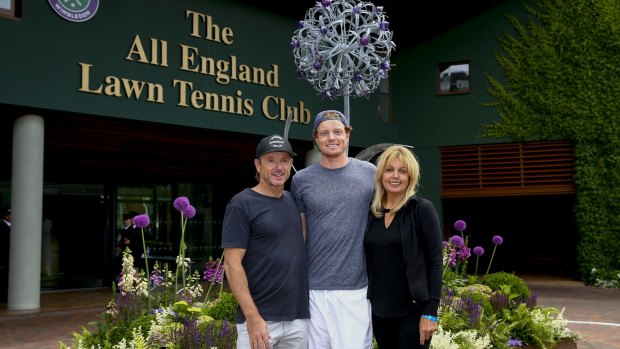 A long way from the Futures tour: Matt Barton with his mum and dad, Jane and Anthony, at Wimbledon. 