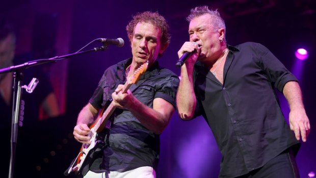 The Marsh and Lillee of Australian rock 'n' roll: Cold Chisel's Ian Moss and Jimmy Barnes crank it up at Rod Laver Arena.