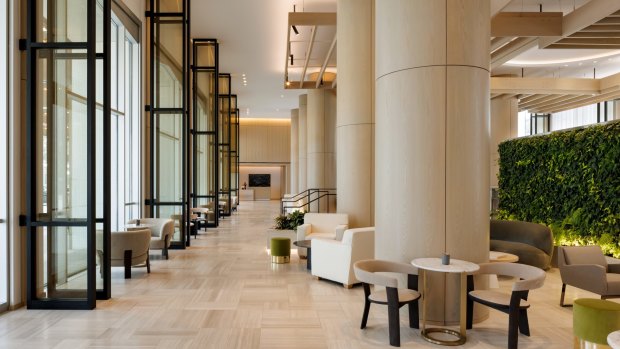 The lobby now has floor-to-ceiling windows that retract into the floor, making the space open-air, while banks of plants, water features and extensive use of stone and timber create serenity.