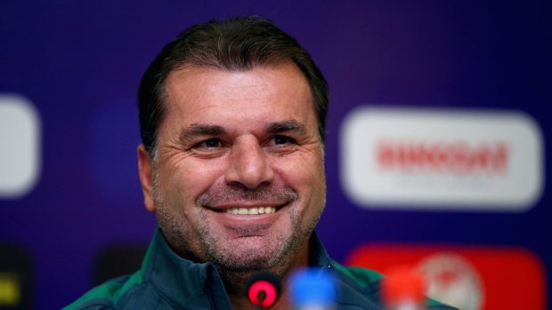 All smiles ... Socceroos coach Ange Postecoglou was happy with the way Australia stayed patient and controlled the game in their 3-0 win against Tajikistan.