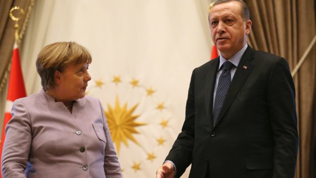 Turkish President Recep Tayyip Erdogan, right, and German Chancellor Angela Merkel.