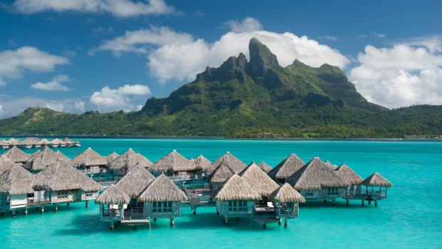 Overwater bungalows at the St Regis Bora Bora Resort.