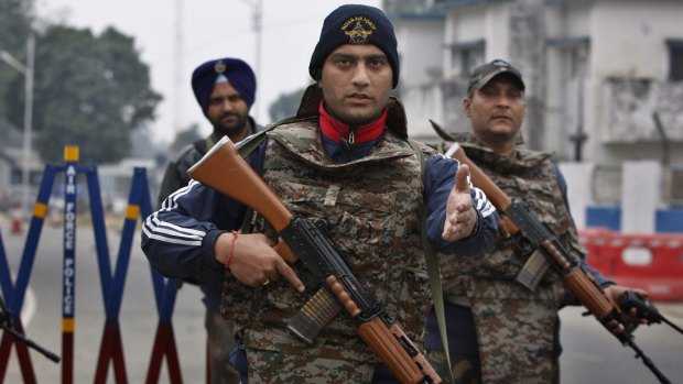 Soldiers patrol the Pathankot air base on Monday.