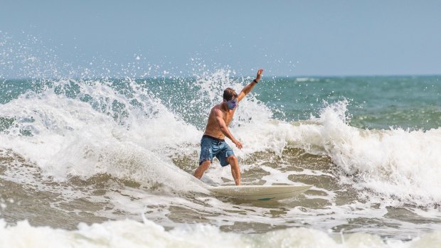 Surfing at Sun and Moon Bay. 