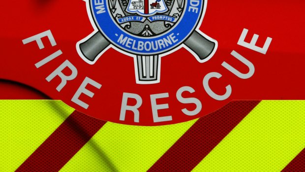 A large grassfire is burning out of control north of Werribee, with the CFA issuing a 'watch and act' alert for surrounding areas including Tarneit and Truganina.