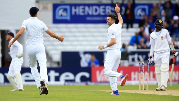 Destroyer: James Anderson celebrates with Steven Finn after bowling Sri Lanka's Nuwan Pradeep to win the first test for England and to record his second five-wicket haul.