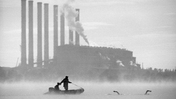 Swimmers in the cooling pond of the Hazelwood brown coal power plant.
