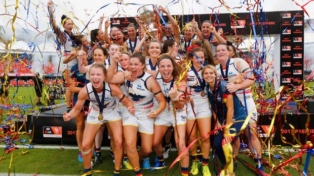 The inaugural AFLW premiers the Adelaide Crows celebrate their win.