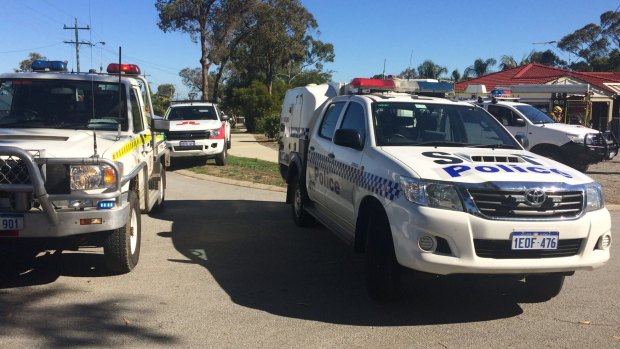 A woman died on a driveway after apparently catching fire in a Byford home blaze