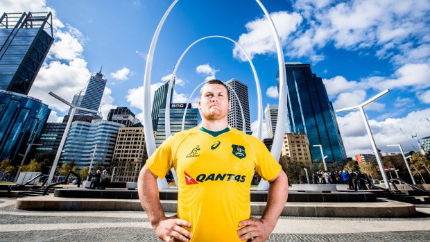 Propping up the scrum: Tom Robertson can hardly believe he is a Wallaby.