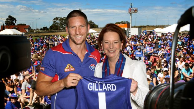 Former prime minister and Western Bulldogs no.1 ticket holder Julia Gillard with player Matthew Boyd.