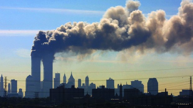 Smoke billows from the twin towers of the World Trade Center in New York after airplanes crashed into both towers on September 11, 2001.