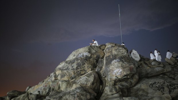 Muslim pilgrims pray on a rocky hill called the Mountain of Mercy, on Tuesday, near the holy city of Mecca, where the prophet Muhammad is believed to have delivered his last sermon nearly 1400 years ago.