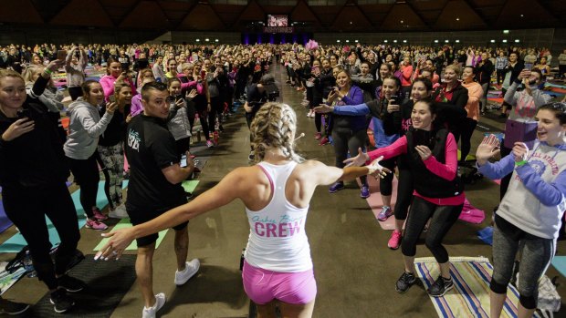 Ashy Bines arrives to lead a class for her World Booty Tour.