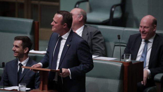 Liberal MP Tim Wilson looks up to the public gallery to ask Ryan Bolger to marry him.