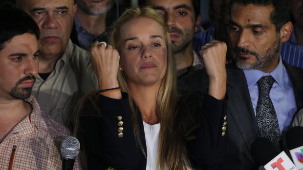 Lilian Tintori, centre, wife of jailed opposition leader Leopoldo Lopez,  gestures during a news conference in Caracas on Thursday.