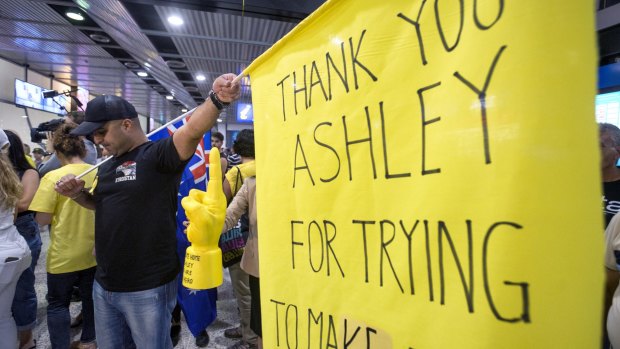 Supporters of anti-Islamic State fighter Ashley Dyball await his return at Melbourne Airport.