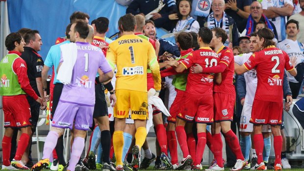 A melee breaks out at half-time during the Melbourne City-Adelaide United clash at AAMI Park.