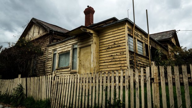 The ramshackle residence in Essendon where a woman was trapped for days under the floor.