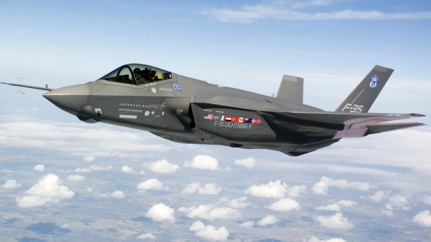 An F-35 Lightning II makes a test flight over Fort Worth, Texas, in 2008. The Canadian flag can be seen next to Australia's, as both countries were part of the manufacturing consortium.