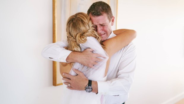 Mike Baird in tears as he sees Laura for the first time in her wedding dress.