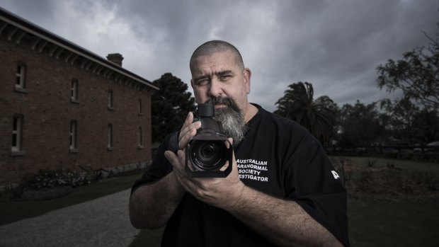 Bill Tabone, head of the Australian Paranormal Society,  with some of his tools of the trade. 