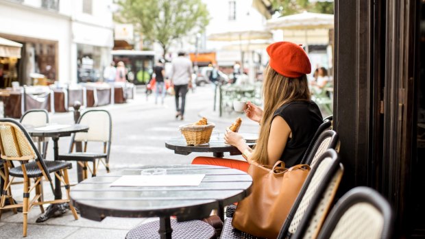 Tipping point: a Paris cafe.
