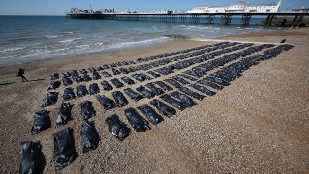 Amnesty International placed 200 body bags next to the sea in Brighton, England, to highlight the migrant crisis in the Mediterranean.
