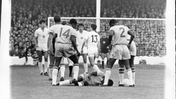 Brazilian star Pele lies injured during the World Cup match against Bulgaria in 1966.