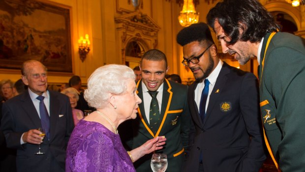 Awesome:Henry Speight (centre) meets Queen Elizabeth II with South Africa's Bryan Habana (right) and Victor Matfield at Buckingham Palace. 