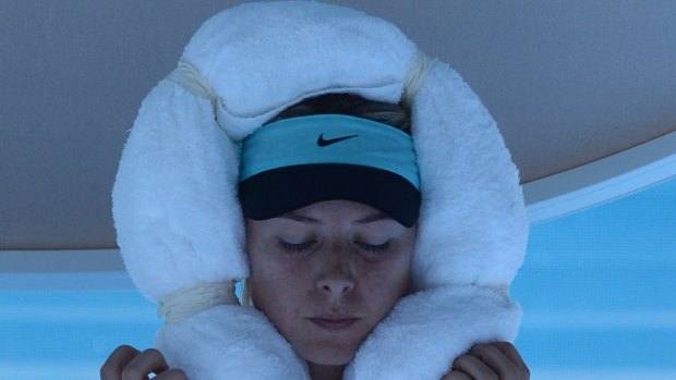 Russia's Maria Sharapova cools off with an ice towel this year.